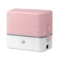 Double-layer portable heated lunch box with stainless steel liner showing push-button controls and power cord