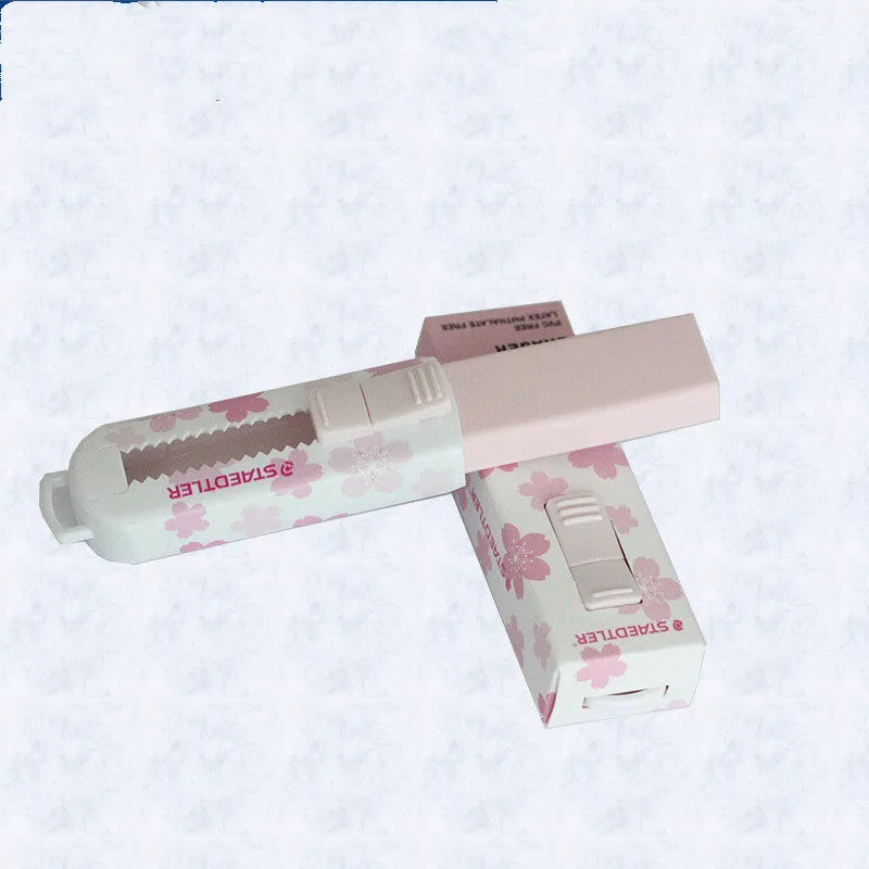 Square pink rubber eraser tool with replaceable core measuring 86mm