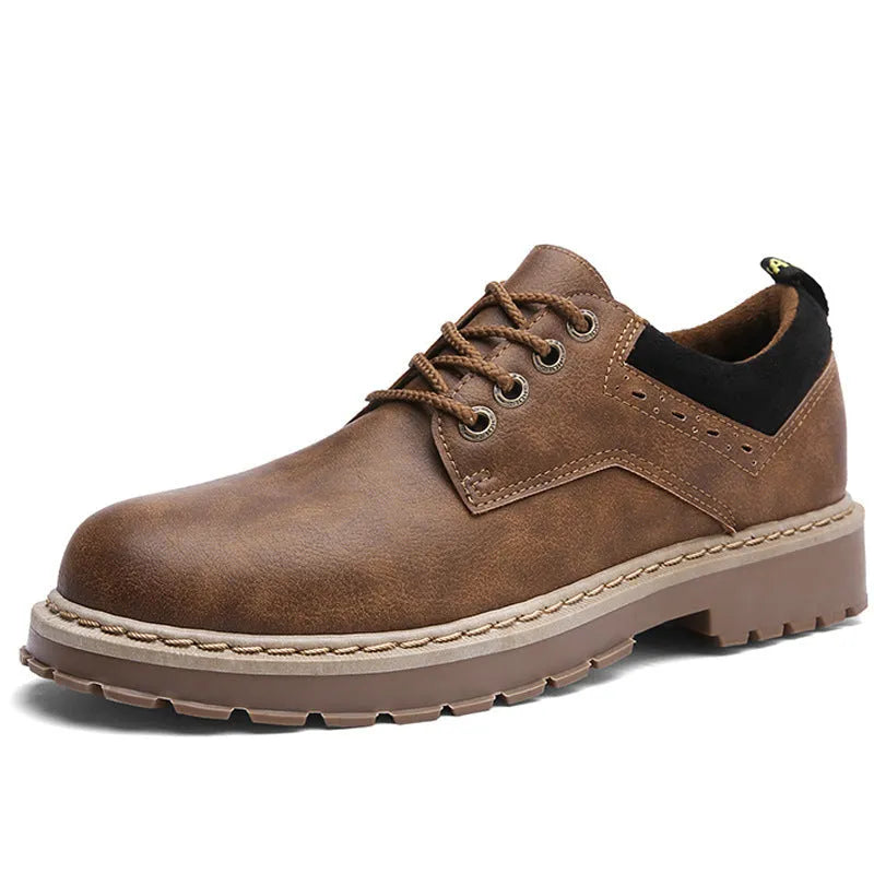 Men's black casual shoes with round toe and front-tie laces on a rubber sole