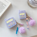 Purple silicone clamshell case for Apple AirPods with fur ball pendant attached