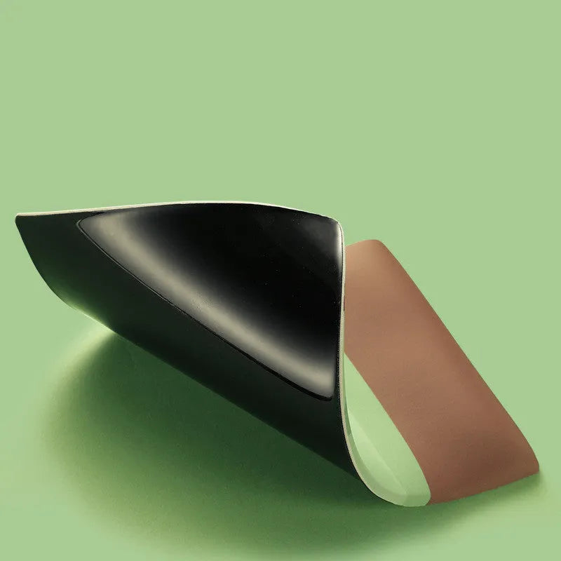 Kiwi fruit design silicone mouse pad with integrated thick wrist support cushion on a desk