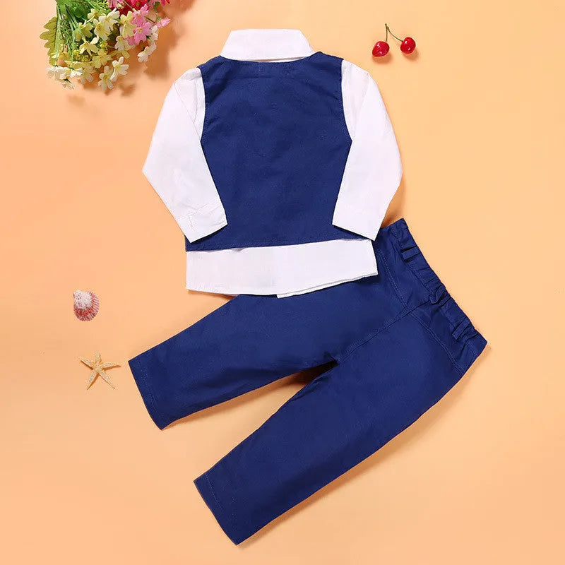 Blue boys' smart casual clothing set with turtleneck, waistcoat, tie, and trousers on a hanger