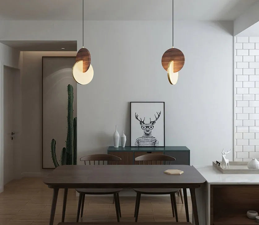 Long-line solid walnut wood wall chandelier with a carved finish in a simple modern style.