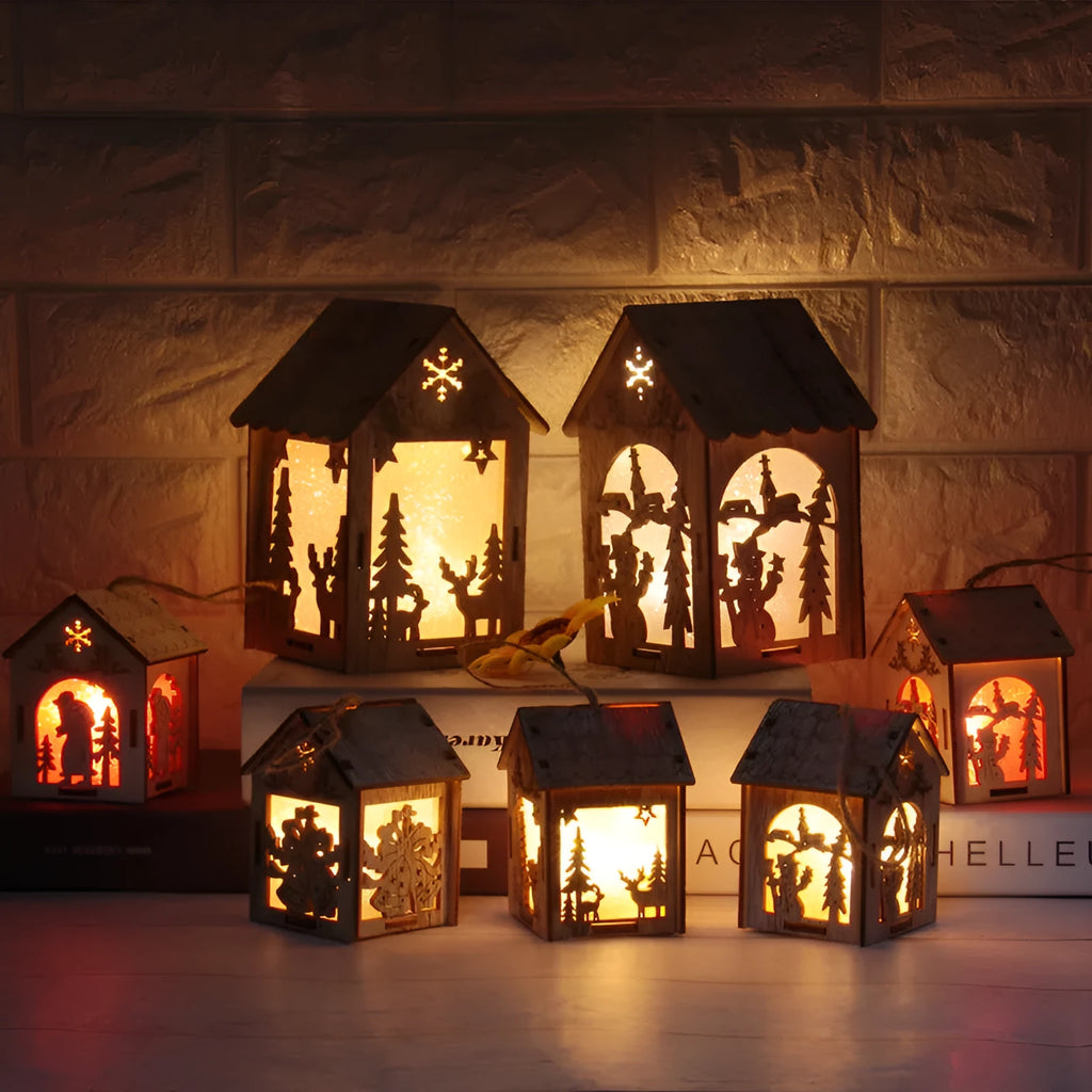 Set of three wooden Christmas house decorations with snowman and Santa figures in natural wood colour