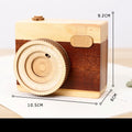 Camera-shaped wooden music box with rotating mechanism on pine wood base
