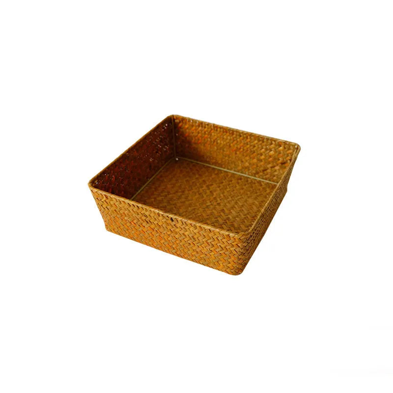 Straw desk storage box in brown colour showing rectangular shape and woven texture