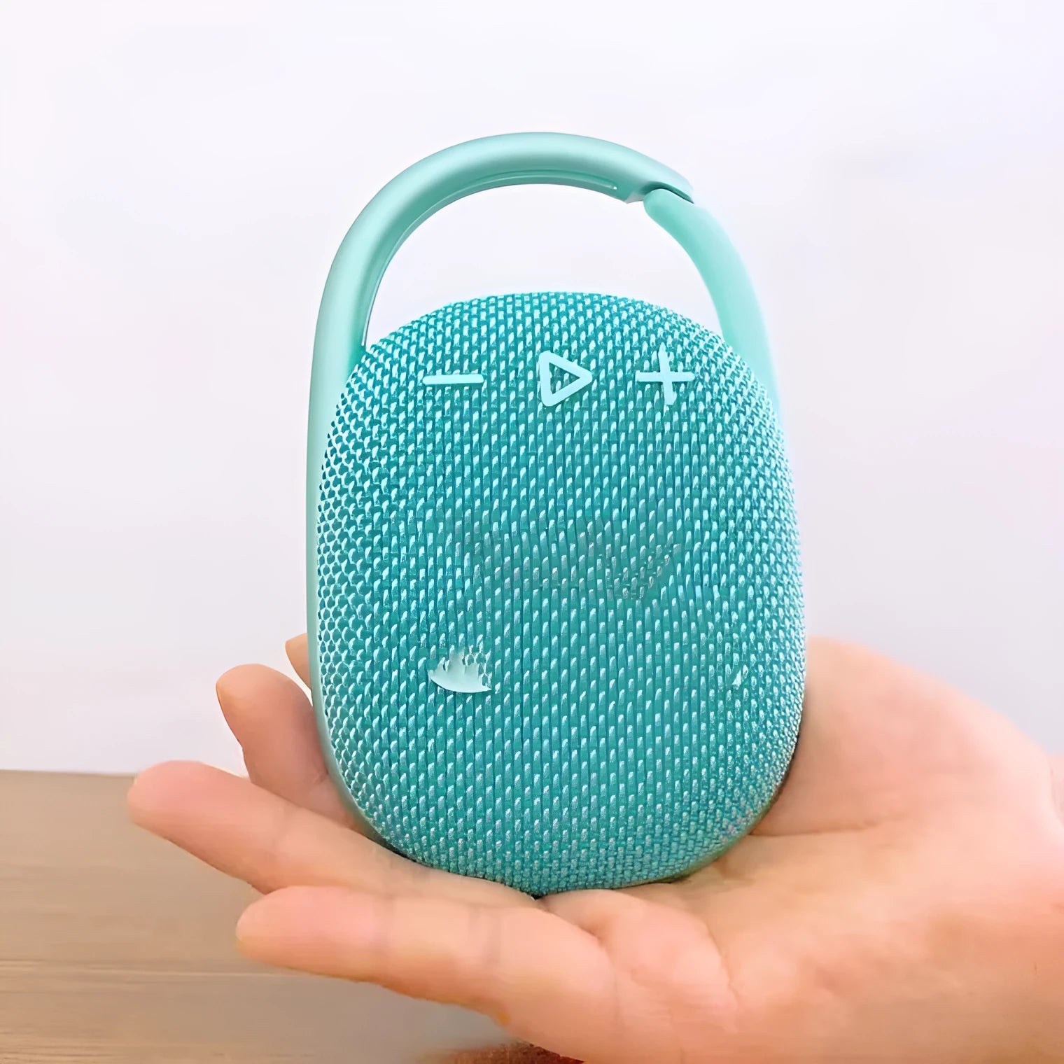 Small portable Bluetooth speaker in choice of colours: pink, blue, black, red, silver grey, green.