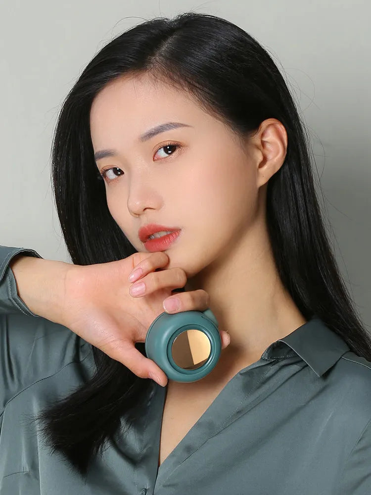 Mini clip fan with flexible clip, 900mAh USB charging, three speed settings in green