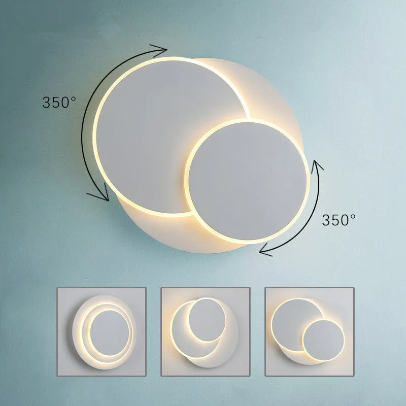 Modern round LED wall lamp in black or white with push button switch