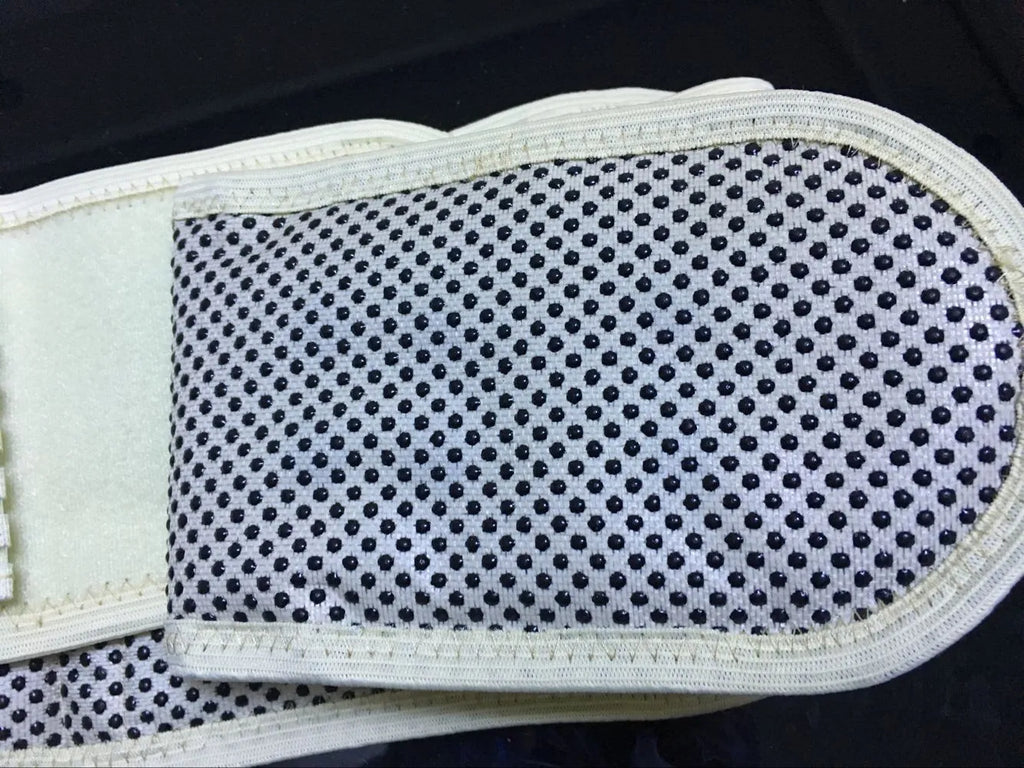Self-heating magnetic waist protection belt in elastic cloth for lumbar muscle strain support