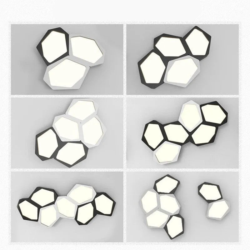 Black and white geometric shaped iron LED ceiling light on a ceiling, showing its special shape and modern design.