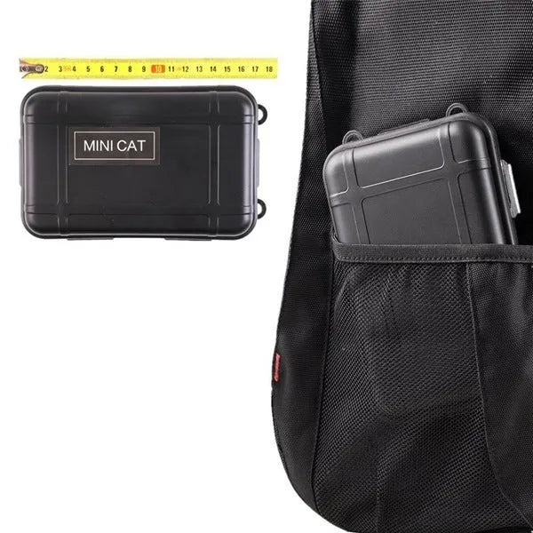 13-piece black outdoor survival tool set displayed with shockproof case open, showing compass, flashlight, saber, and blanket.