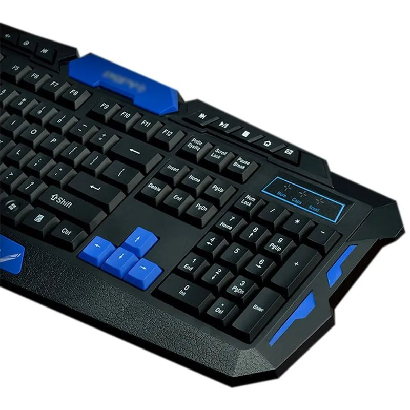 Black and blue wireless keyboard and mouse set on a desk showing ergonomic design.