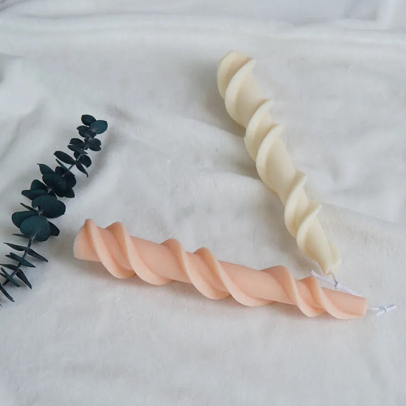 Silicone candle mould for making spiral lace rod decorative pillar candles.