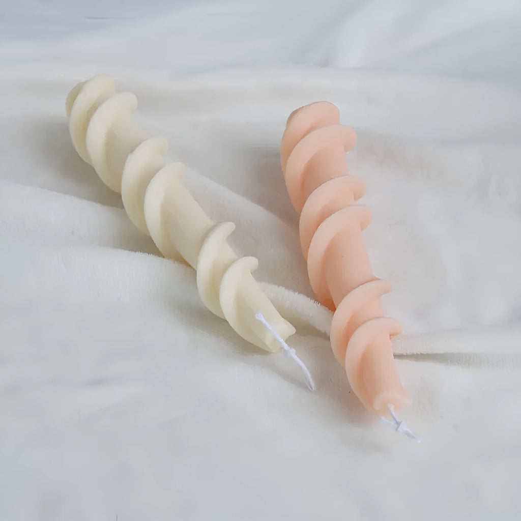 Silicone candle mould for making spiral lace rod decorative pillar candles.