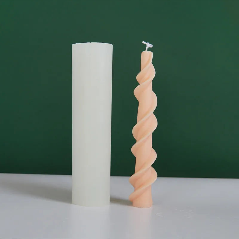 Silicone candle mould for making spiral lace rod decorative pillar candles.