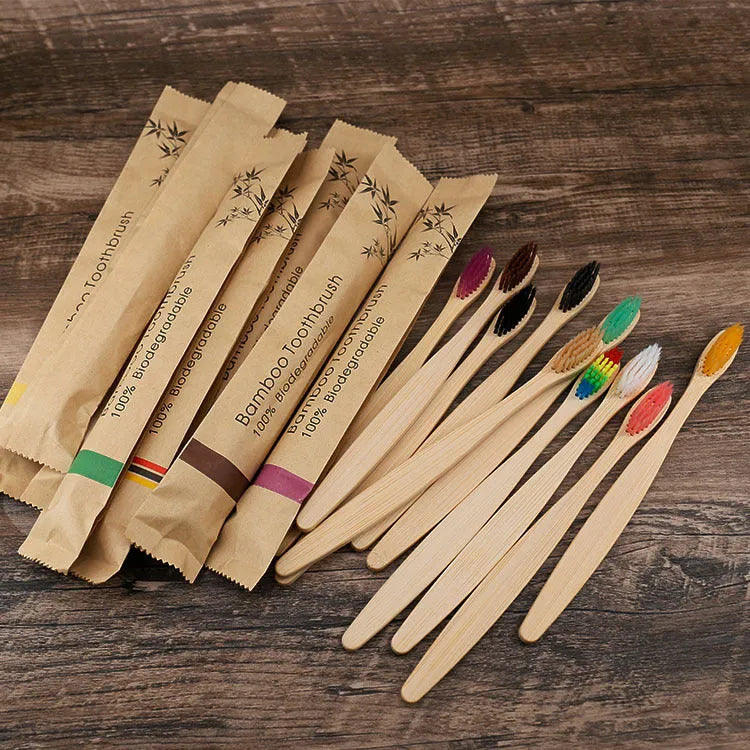 Set of 10 colourful bamboo toothbrushes with charcoal bristles for sustainable dental care