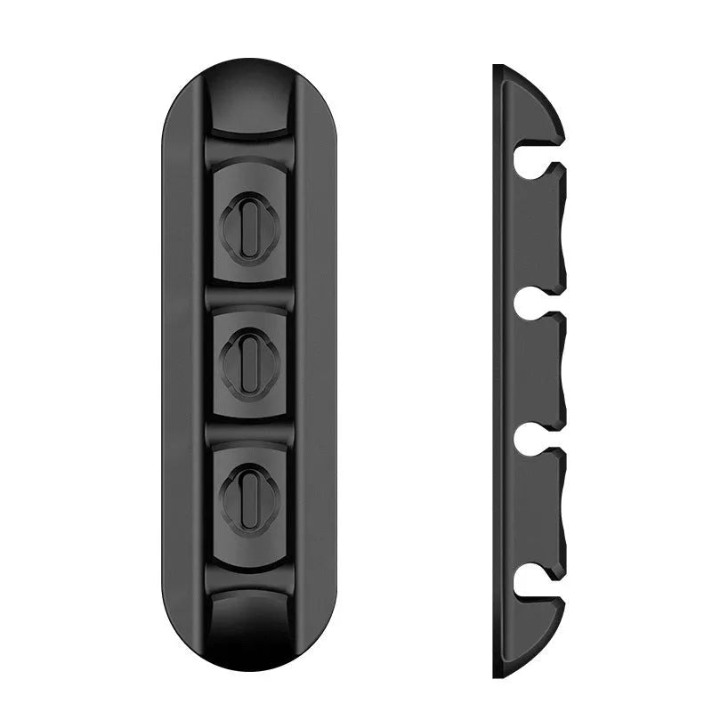 Black soft plastic desktop charging stand with magnetic cable organiser