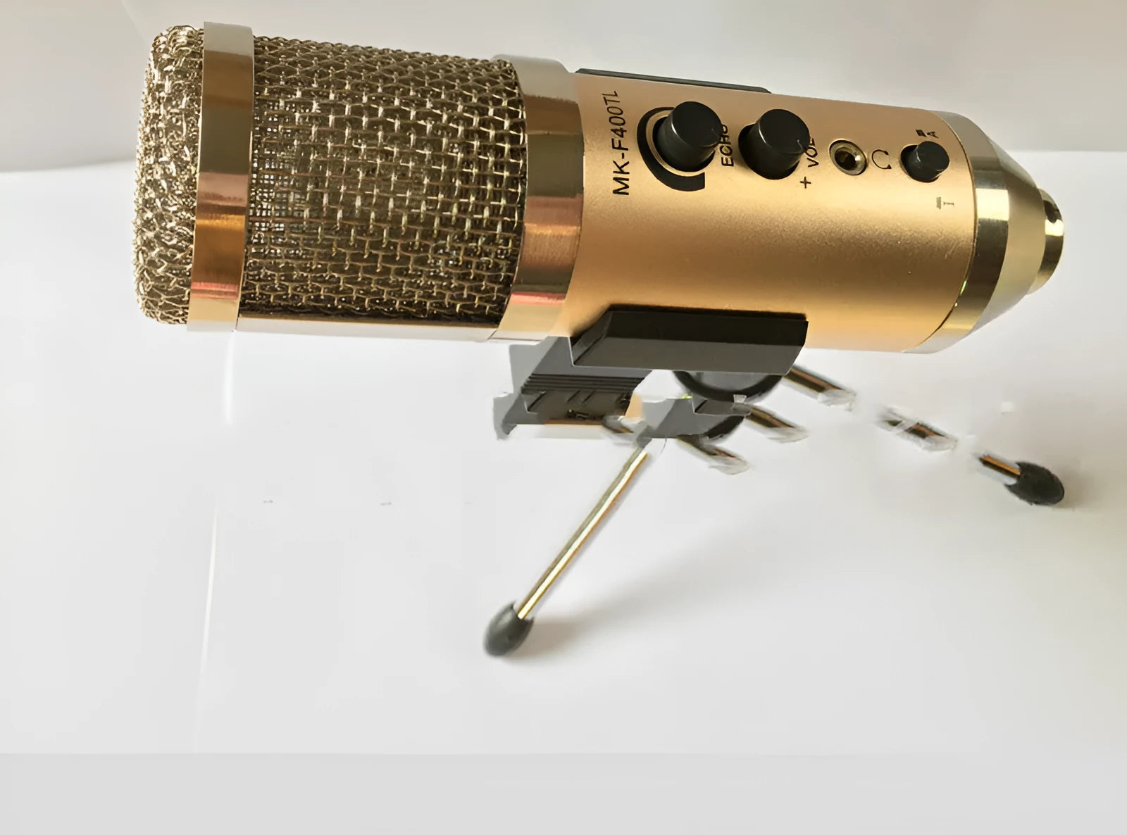 Gold wireless USB condenser microphone with stand bracket for mobile phone and computer.