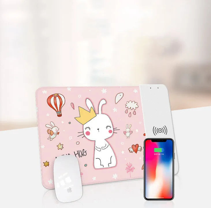 Cartoon design wireless charging mouse pad with RGB lighting on a desk