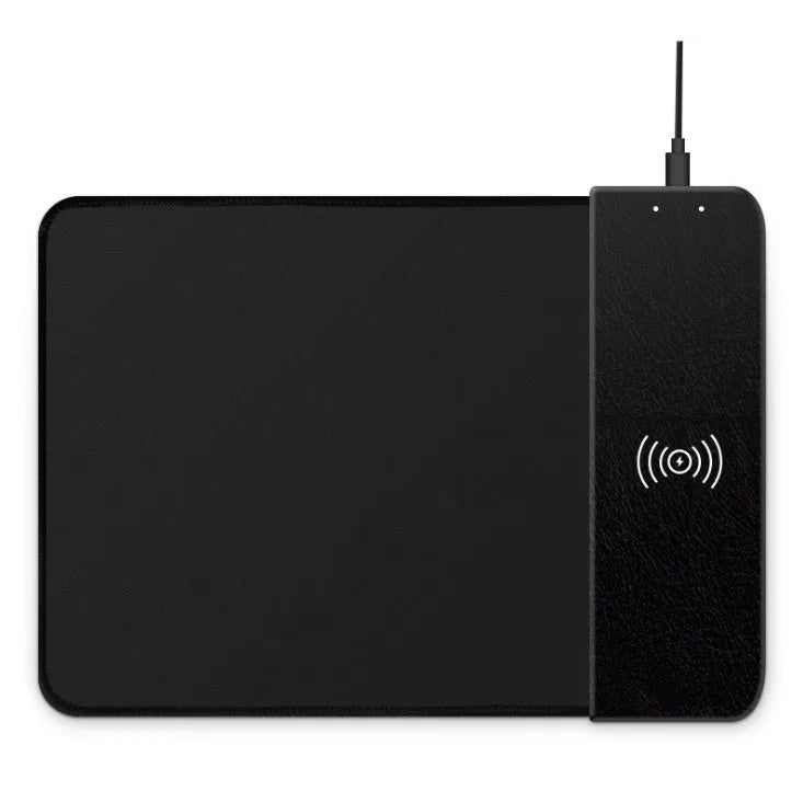 Cartoon design wireless charging mouse pad with RGB lighting on a desk