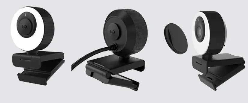 Black USB webcam for computer with magnetic privacy cover, shown on a laptop screen.