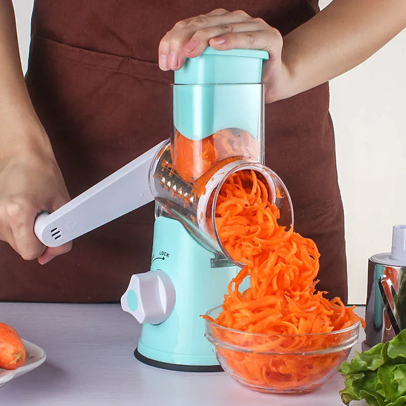Blue multi-function food chopper with suction cup base for slicing, grating and shredding vegetables.