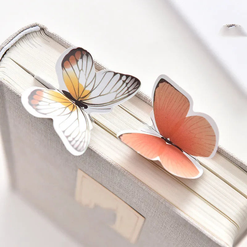 Set of butterfly design paper bookmarks on a white background, showing their 13.5cm length.