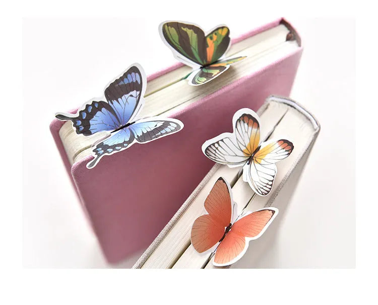 Set of butterfly design paper bookmarks on a white background, showing their 13.5cm length.