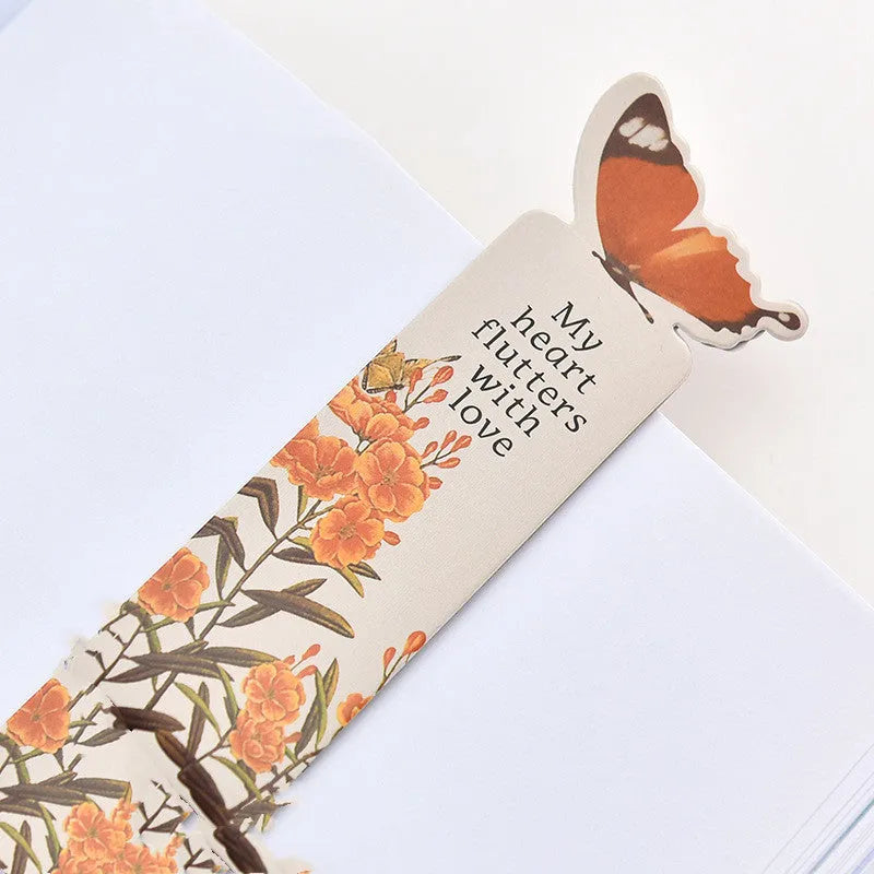 Set of butterfly design paper bookmarks on a white background, showing their 13.5cm length.
