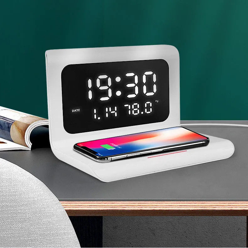 White or black wireless charger alarm clock with digital display showing time temperature humidity and 10W charging status