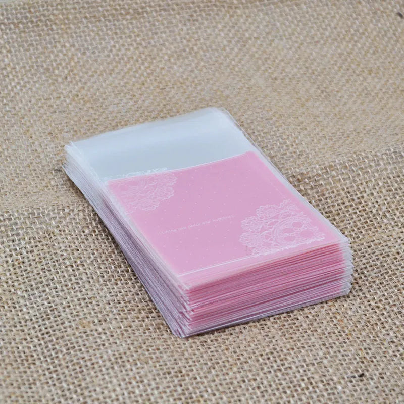 Pink self-adhesive plastic packaging bag showing UV printing and adhesive strip closure