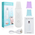 White multi-functional facial beauty instrument with LED colour light, acne needle, blackhead suction and shoveling machine attachments on table