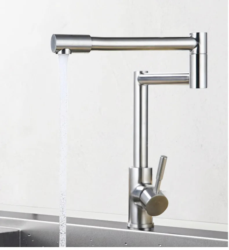 Silver stainless steel kitchen tap with 360-degree rotating spout and dual hot and cold controls