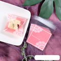Pink self-adhesive plastic packaging bag showing UV printing and adhesive strip closure