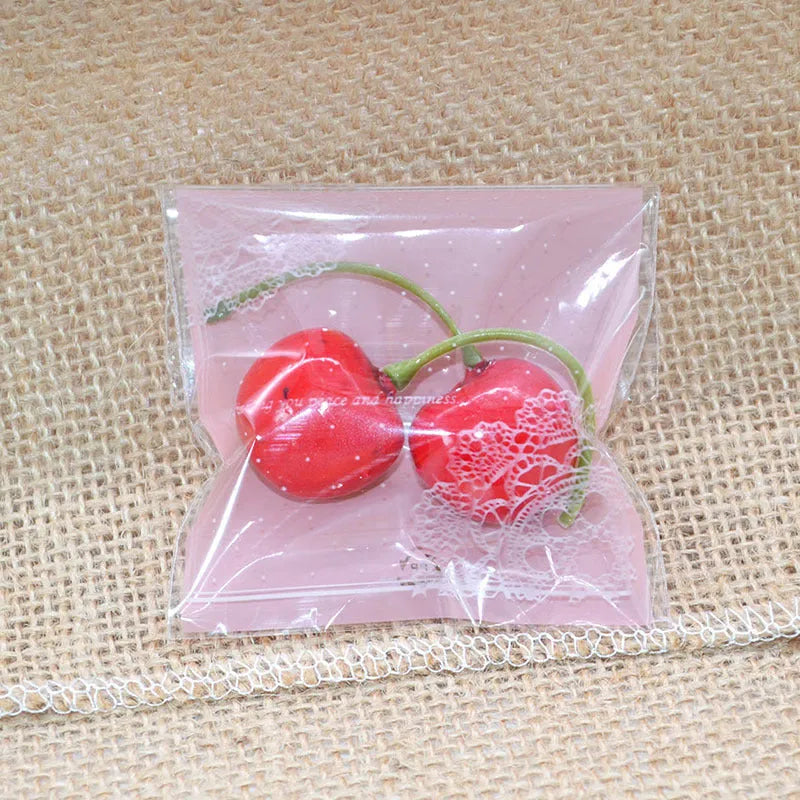 Pink self-adhesive plastic packaging bag showing UV printing and adhesive strip closure