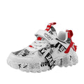 Boys' beige blue and white red Velcro sports sneakers with rubber soles on a white background.
