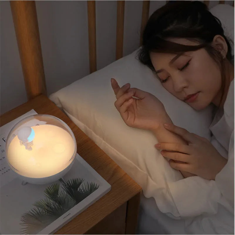 USB-powered cartoon night light with sleep aid option in blue or white colour