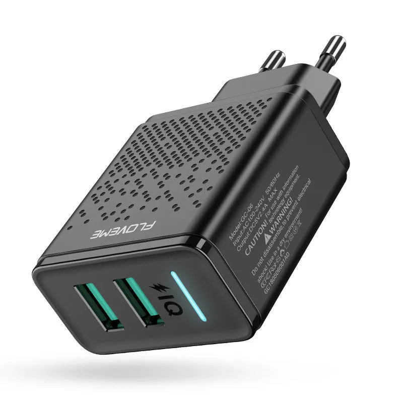 Black and white dual USB port wall charger with EU standard plug for charging phones and tablets