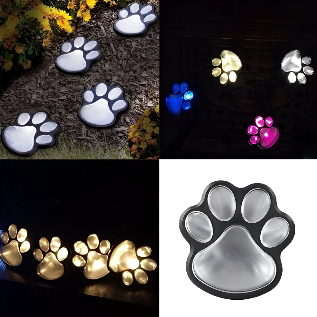 Four black bear paw print solar garden lights with solar panel pole for outdoor path decoration
