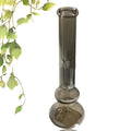 Clear colourful geometric glass vase on a table as a modern decorative centrepiece.