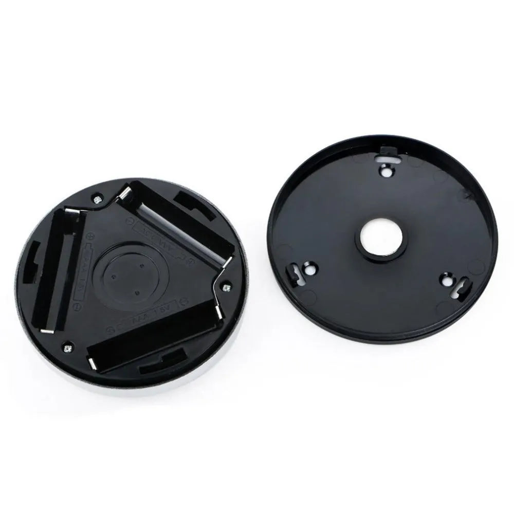 Silver square wireless motion sensor night light with compact 80mm design on a surface.