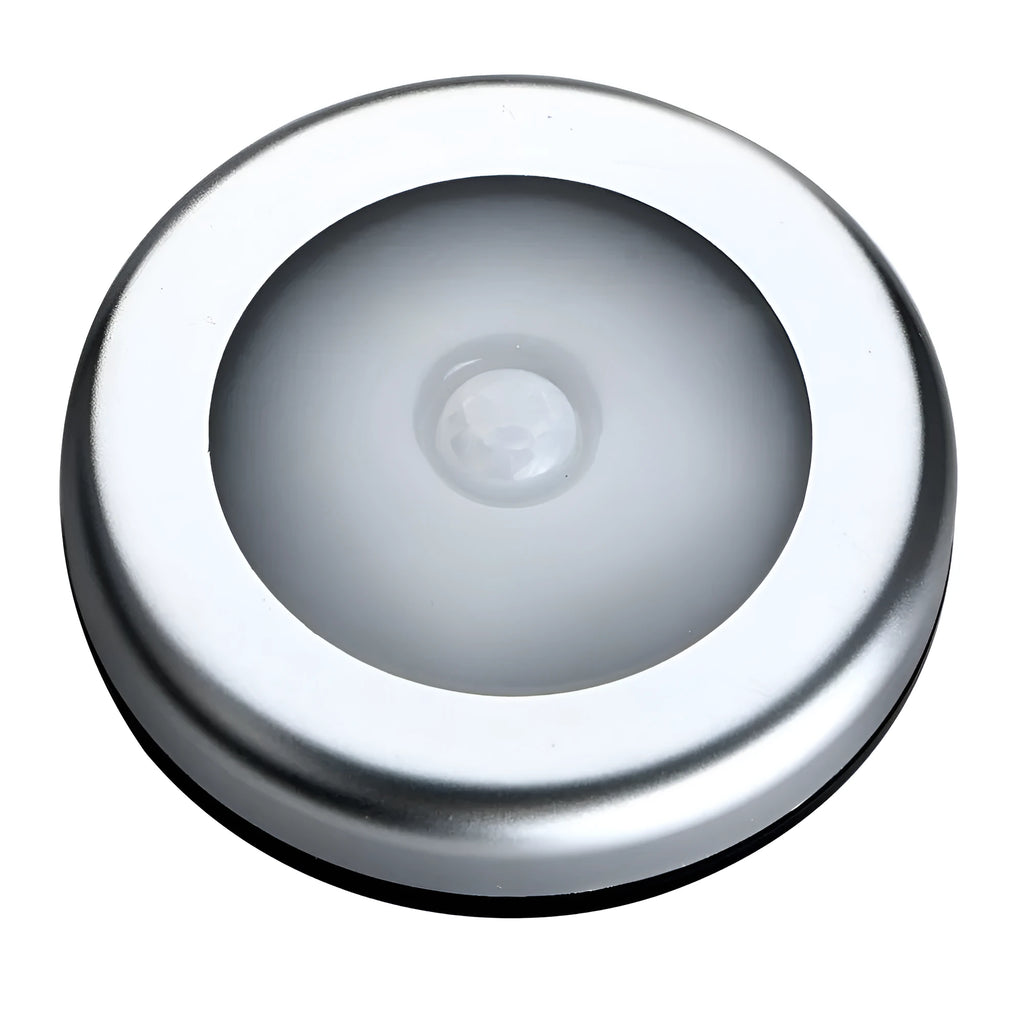 Silver square wireless motion sensor night light with compact 80mm design on a surface.