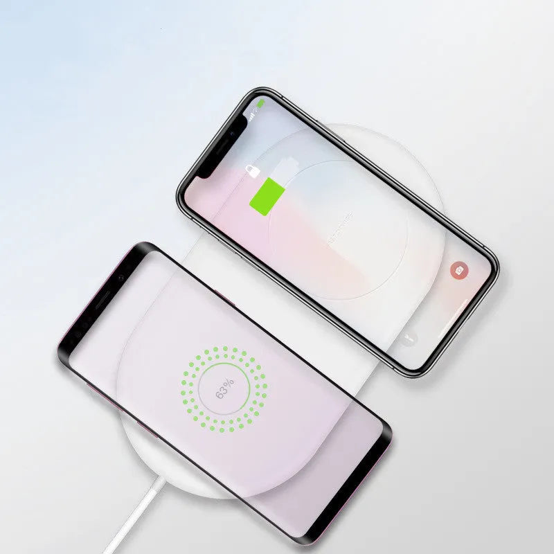 White dual wireless charging station for two mobile phones