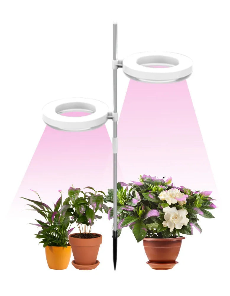 Compact white PC shell plant growth light for desk use, showing single head design.