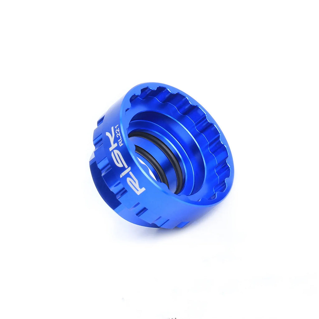 Blue aluminium bicycle chainring removal tool for Shimano 12-speed direct mount cranksets.