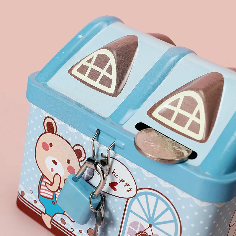Blue house-shaped tinplate piggy bank for coin storage measuring 112mm tall