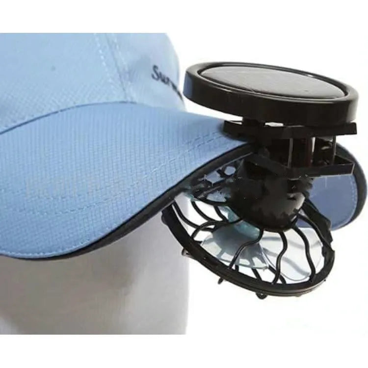 Black solar powered clip-on fan with photovoltaic panel for portable outdoor cooling