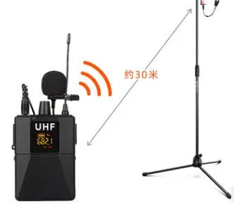 Black wireless lavalier microphone with clip for lapel attachment