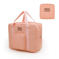 Cube-shaped travel storage bag in oxford cloth with zip closure for clothing organisation